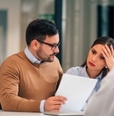 Adviser explaining conditions to a couple
