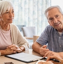 couple planning their investments with financial