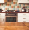 blurred kitchen interior and napkin and desk