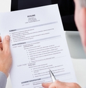 Man Holding Curriculum Vitae