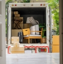 truck carrying goods moving house
