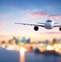 airplane in flight at twilight
