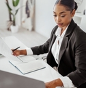 female hr manage using laptop