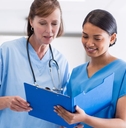 nurse and doctor discussing