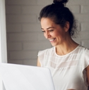 businesswoman holding a laptop
