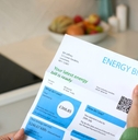 woman opening uk energy bill