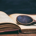 wooden spoon on a vintage book