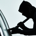 criminal attempting to steal a car