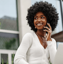 Smiling woman talking on phone
