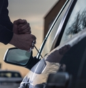 trying to break into car 