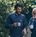 father and son talking together