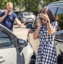 Woman making a call after an accident
