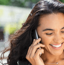 Smiling woman talking on phone