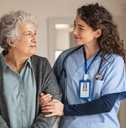 caregiver assist senior woman