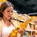 woman buying food at supermarket