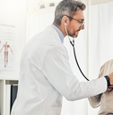 doctor consulting to senior patient