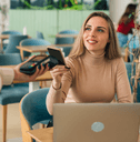 person paying bill at restaurant
