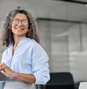 business woman holding tablet in office