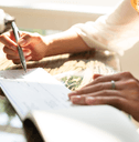 person signing check