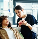 dentist explaining to her patient