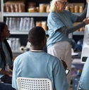 woman leading a training session for diverse group