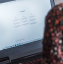 Illustrative editorial of a woman on laptop