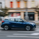 nissan kicks driving on city road