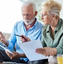 senior couple calculating their bills