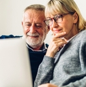 senior couple reading documents