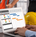 construction manager on laptop
