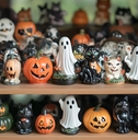 ghosts, pumpkins, and feline decorations display