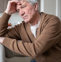 old man with Alzheimer sitting abandoned