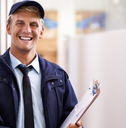 Postal service worker smiling