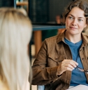 Mental health counselor speaking to patient