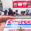 Costco membership card holder in front of counter