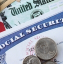 social security number card and calculator on American flag