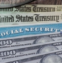 social security card check and hundred dollar bills