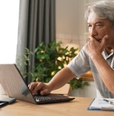business man working and using computer