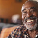Senior man at home smiling