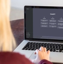woman using chatgpt on laptop