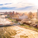 Atlantic City, New Jersey, as seen from aerial view featuring boardwalk and buildings
