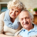 Affectionate elderly couple hugging