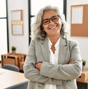 Woman smiling with arms crossed 