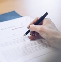 A will is signed by a female notary