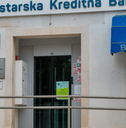 person withdrawing money from atm in croatia