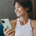 Smiling woman using credit card