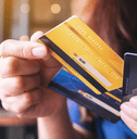 Woman holding and choosing credit card