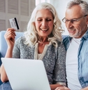Older couple shopping online