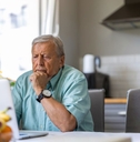 elderly man on laptop