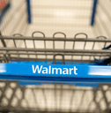 Close up of Walmart shopping cart handle inside store